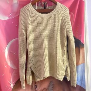 cream colored cozy sweater